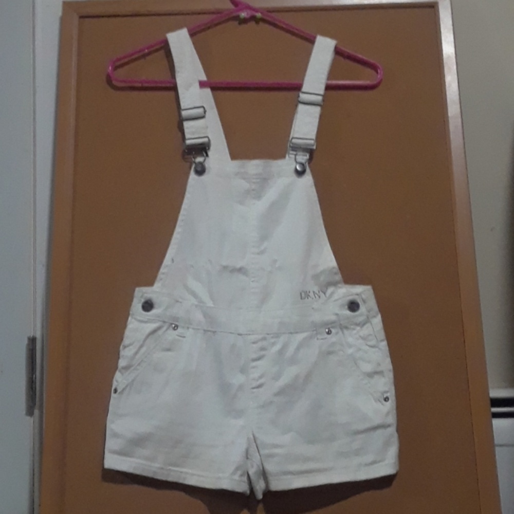 White DKNY overalls.